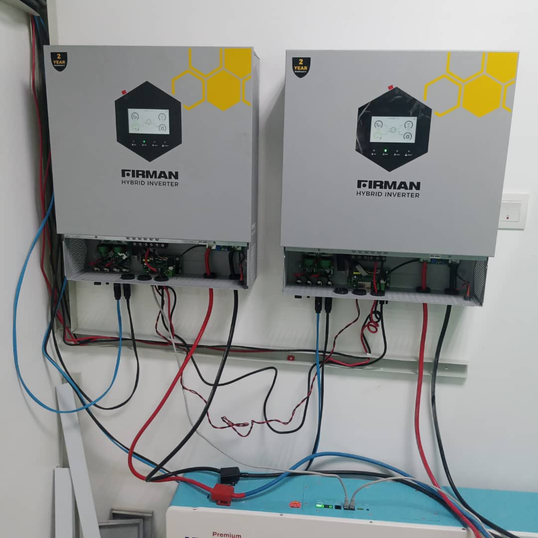 Twin Firman hybrid inverters wired to a lithium battery